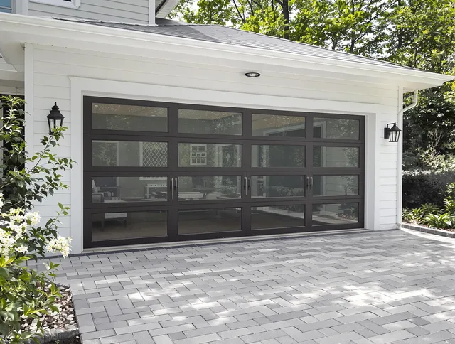 East Los Angeles Garage Door Repair design specialist presenting custom garage door options to East Los Angeles homeowner