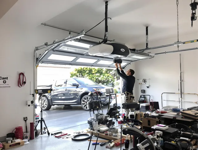 East Los Angeles Garage Door Repair specialist installing smart garage door opener system in East Los Angeles home