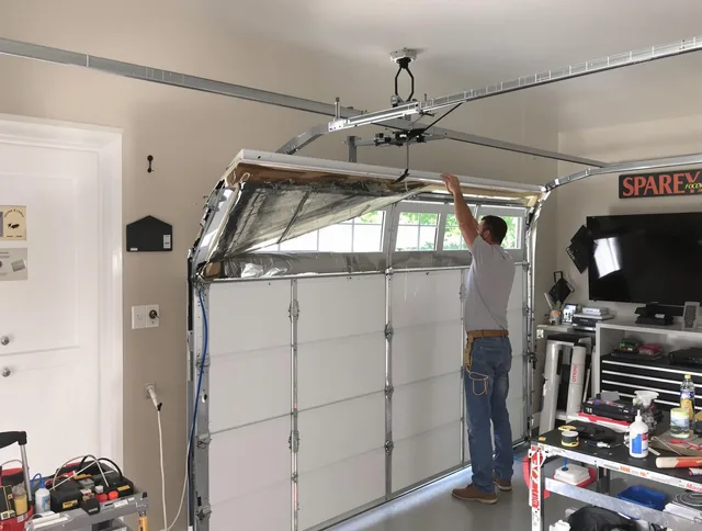Garage door section replacement by East Los Angeles Garage Door Repair in East Los Angeles