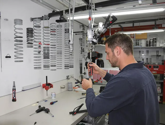 East Los Angeles Garage Door Repair safety certified technician performing precision spring replacement in East Los Angeles