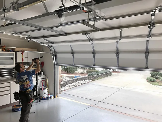 Garage door track repair service by East Los Angeles Garage Door Repair in East Los Angeles